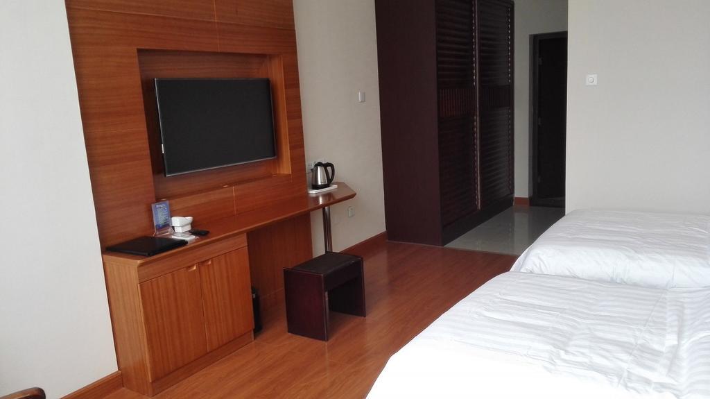 Weihai Times Business Hotel Стая снимка